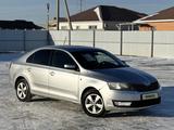 Skoda Rapid 2013 года за 3 200 000 тг. в Атырау – фото 3