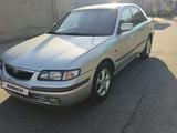 Mazda 626 1998 года за 2 100 000 тг. в Шымкент – фото 2