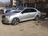 Skoda Rapid 2013 года за 4 300 000 тг. в Караганда – фото 4