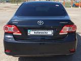 Toyota Corolla 2012 года за 6 590 000 тг. в Актобе – фото 2