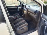 Volkswagen Touran 2008 года за 4 000 000 тг. в Актау – фото 4