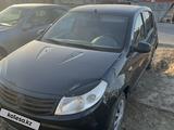 Renault Sandero 2011 года за 3 000 000 тг. в Атырау – фото 2