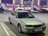 Mazda 626 1998 года за 1 600 000 тг. в Актобе – фото 2