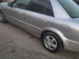 Mazda 323 2002 годаүшін1 700 000 тг. в Мерке – фото 3