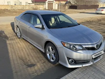 Toyota Camry 2014 года за 8 500 000 тг. в Жанаозен – фото 2