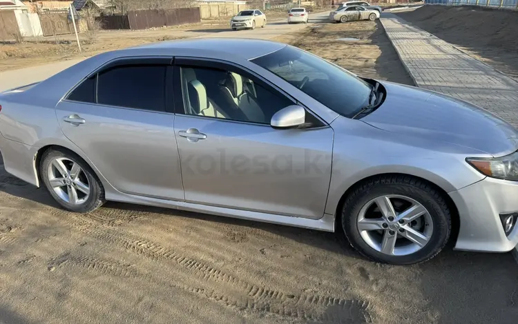 Toyota Camry 2014 года за 8 500 000 тг. в Жанаозен