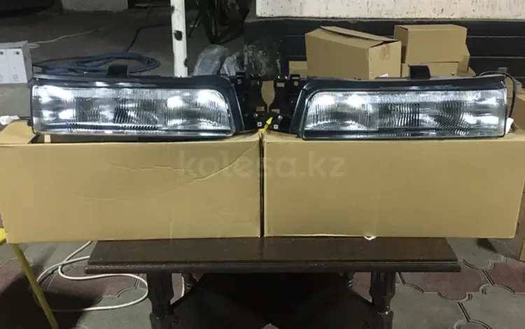 Передние фары на Mazda 626 переходка дубликат хорошего качества! за 30 000 тг. в Алматы