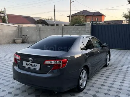 Toyota Camry 2013 года за 7 950 000 тг. в Жанаозен – фото 4