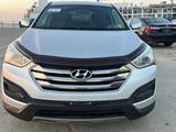 Hyundai Santa Fe 2015 годаүшін7 500 000 тг. в Уральск