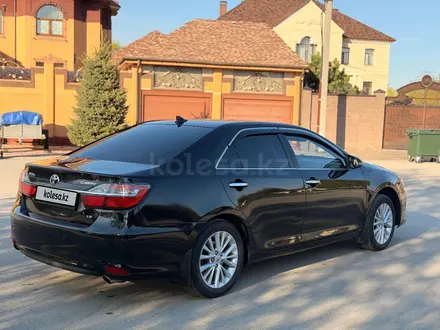 Toyota Camry 2015 года за 12 000 000 тг. в Актобе – фото 5