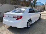 Toyota Camry 2014 годаүшін5 600 000 тг. в Жанаозен – фото 4