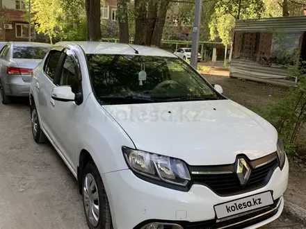 Renault Logan 2015 года за 3 300 000 тг. в Караганда – фото 2