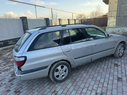 Mazda 626 1998 года за 2 125 000 тг. в Алматы – фото 3