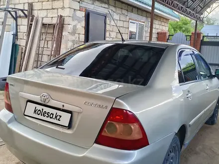 Toyota Corolla 2004 года за 2 200 000 тг. в Актобе – фото 4