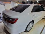 Toyota Camry 2014 года за 11 000 000 тг. в Жанаозен – фото 4