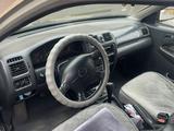 Mazda 323 1997 годаүшін1 600 000 тг. в Астана