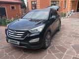 Hyundai Santa Fe 2014 года за 9 000 000 тг. в Алматы