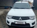 Mitsubishi L200 2014 года за 9 100 000 тг. в Алматы