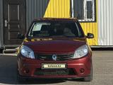 Renault Sandero 2011 года за 3 300 000 тг. в Караганда – фото 2