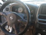 Nissan NP300 2012 года за 2 727 222 тг. в Мерке – фото 5