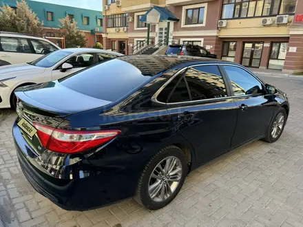 Toyota Camry 2015 года за 6 200 000 тг. в Атырау – фото 6