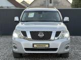 Nissan Patrol 2011 года за 10 590 000 тг. в Актобе – фото 2