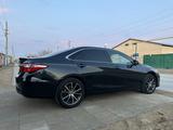 Toyota Camry 2015 года за 6 800 000 тг. в Жанаозен – фото 5