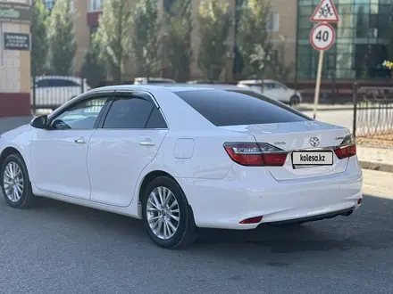 Toyota Camry 2014 года за 11 500 000 тг. в Актобе – фото 4