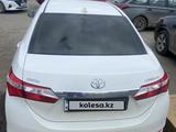 Toyota Corolla 2013 года за 6 300 000 тг. в Актобе – фото 3