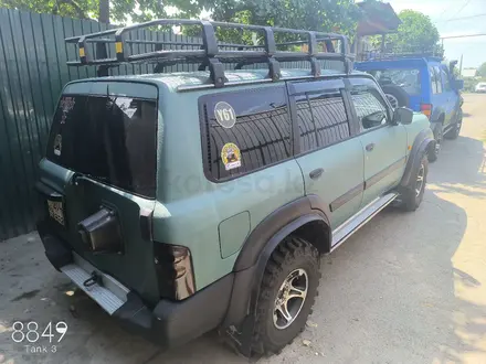 Nissan Patrol 1999 года за 4 000 000 тг. в Алматы – фото 12
