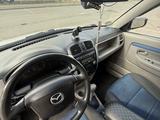 Mazda Demio 2002 года за 2 400 000 тг. в Караганда – фото 4