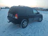 Mazda Tribute 2002 года за 3 650 000 тг. в Караганда – фото 4