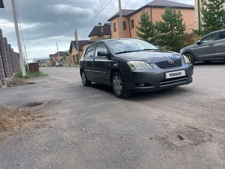 Toyota Corolla 2004 года за 3 750 000 тг. в Караганда – фото 4