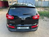 Kia Sportage 2012 года за 9 000 000 тг. в Актобе – фото 2