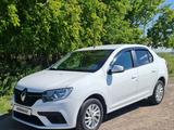 Renault Logan 2021 года за 4 300 000 тг. в Караганда – фото 2