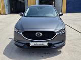 Mazda CX-5 2021 года за 12 300 000 тг. в Атырау