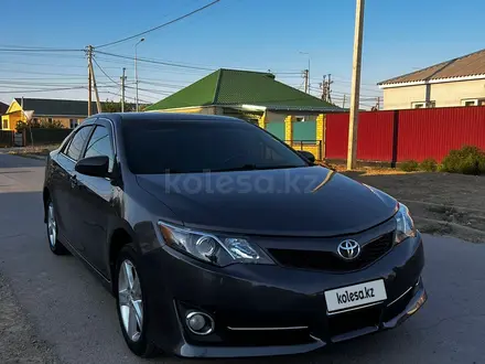 Toyota Camry 2014 года за 6 000 000 тг. в Атырау