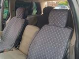 Kia Carnival 1999 года за 2 500 000 тг. в Шымкент – фото 3