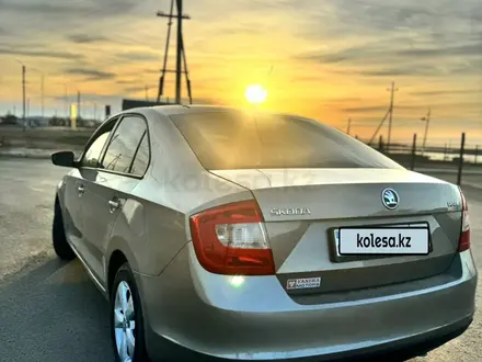 Skoda Rapid 2013 года за 5 400 000 тг. в Атырау