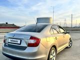 Skoda Rapid 2013 года за 5 400 000 тг. в Атырау – фото 3