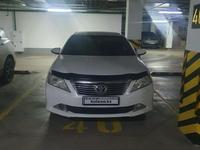 Toyota Camry 2014 года за 8 900 000 тг. в Астана