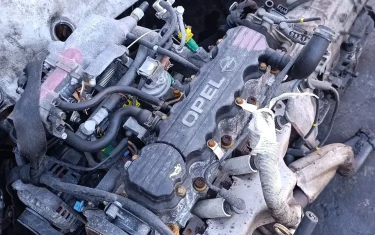 Опель двигатели и коробки за 333 222 тг. в Астана