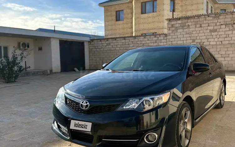 Toyota Camry 2014 года за 6 800 000 тг. в Жанаозен