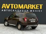 Renault Duster 2014 года за 4 900 000 тг. в Актобе – фото 4