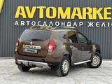 Renault Duster 2014 года за 4 900 000 тг. в Актобе – фото 3