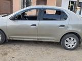 Renault Logan 2014 года за 2 400 000 тг. в Кулан – фото 4