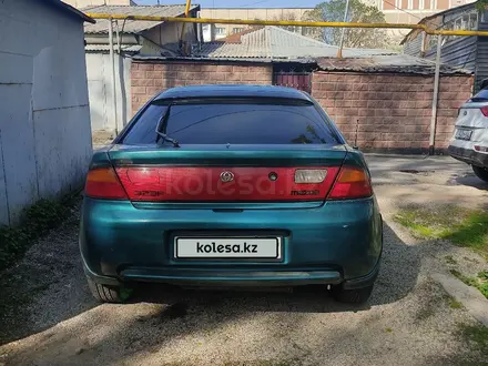 Mazda 323 1996 года за 1 200 000 тг. в Алматы – фото 4