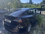 Tesla Model Y 2022 года за 10 800 000 тг. в Алматы – фото 4