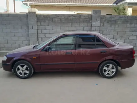 Mazda 323 1999 года за 1 500 000 тг. в Алматы – фото 2