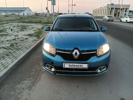 Renault Logan 2014 года за 2 100 000 тг. в Астана – фото 2